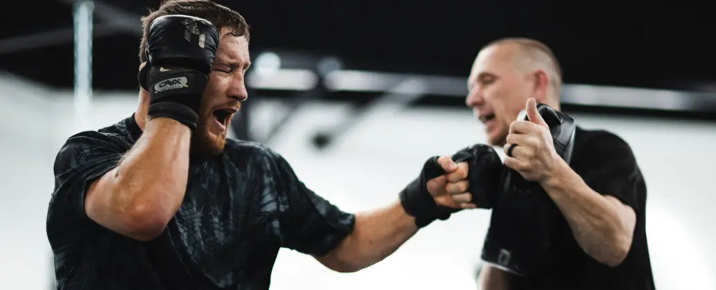 UFC fighter Justin Gaethje training with ONX gloves and Trevor Wittman.