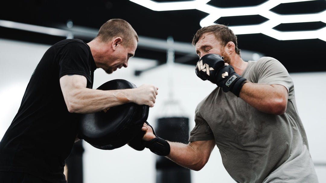 The Complete Guide to MMA Training Pads: Mitts, Paddles, Thai Pads, and Shields
