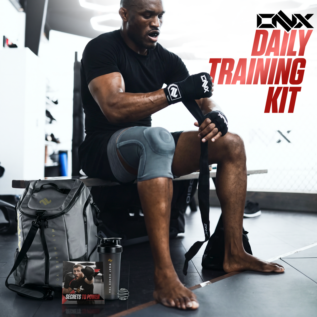 Fighter in a gym unpacking the ONX Daily Training Kit duffle bag with hand wraps and shaker visible