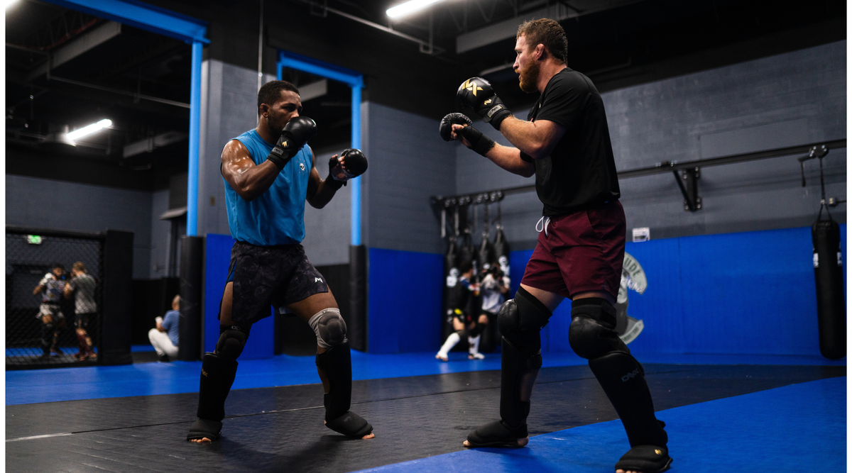 ONX athletes sparring with full protective gear