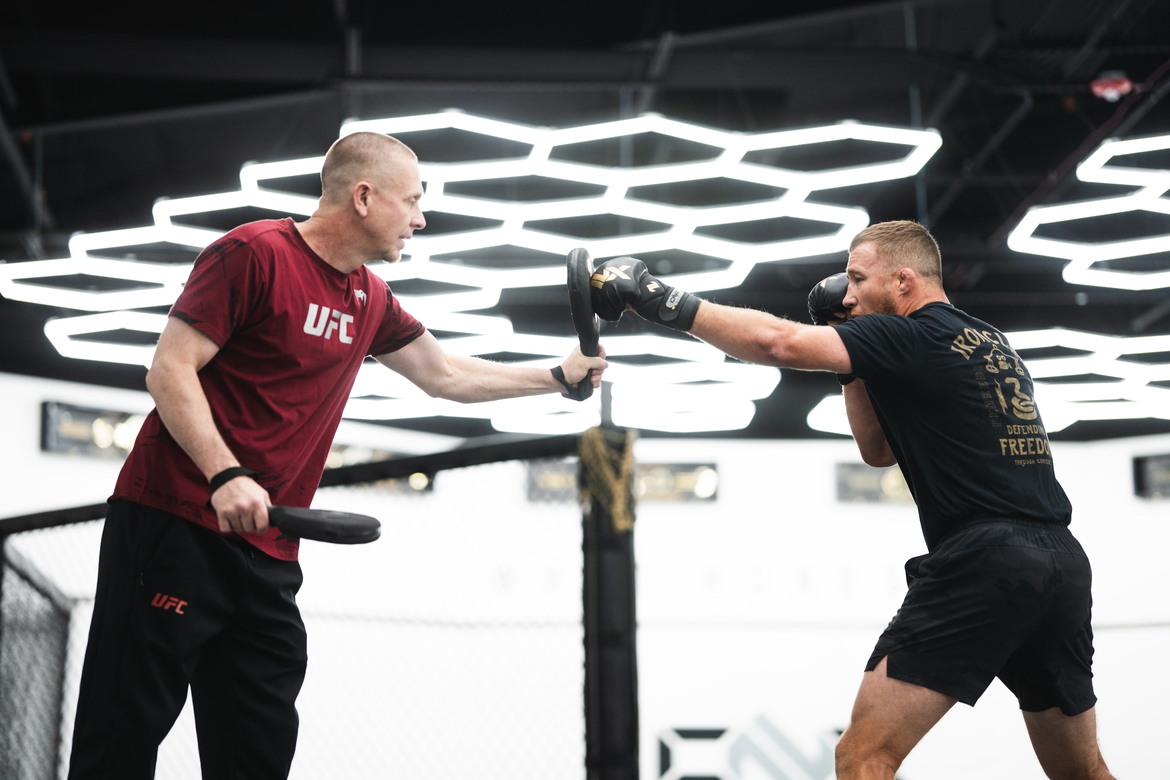 Trevor Wittman and Justin Gaethje training for UFC at the ONX gym with ONX gloves and equipment.